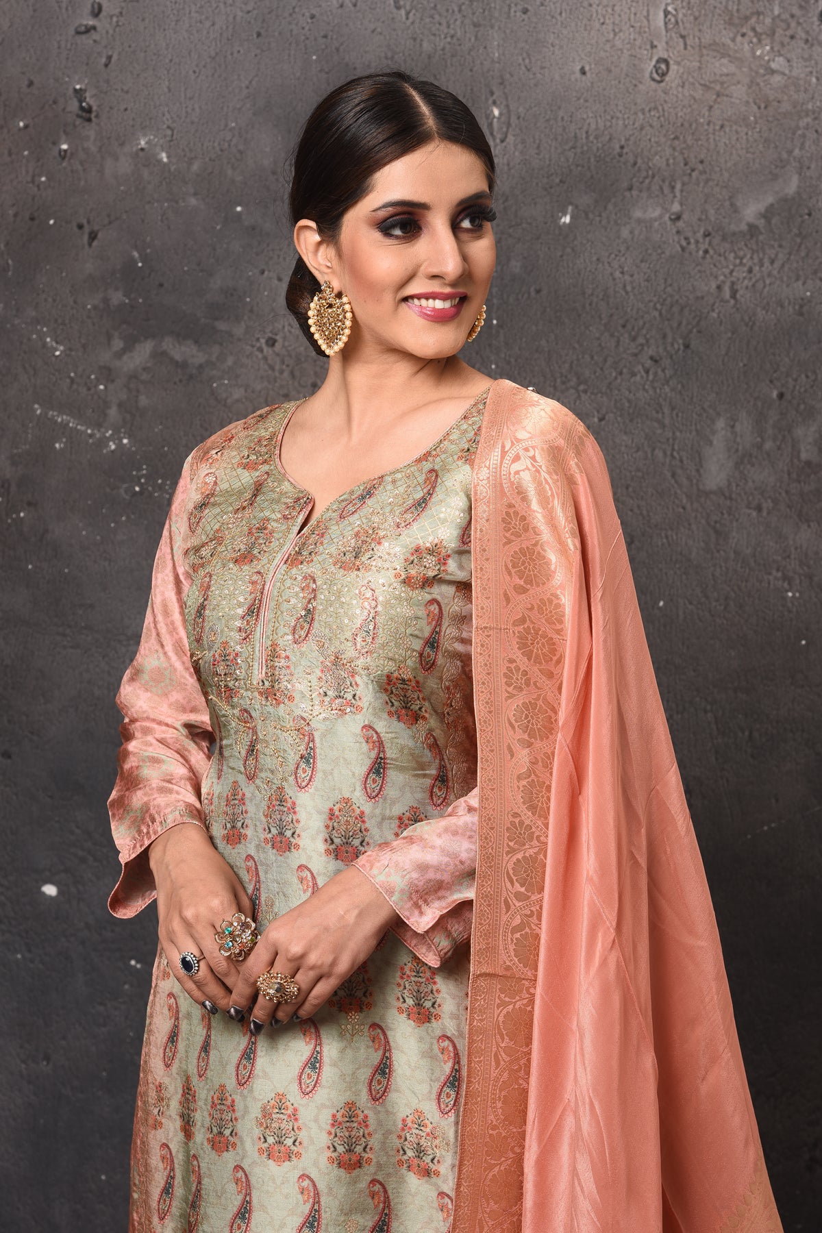 Shop stunning pista green and peach embroidered salwar suit online in USA with dupatta. Get set for weddings and festive occasions in exclusive designer Anarkali suits, wedding gown, salwar suits, gharara suits, Indowestern dresses from Pure Elegance Indian fashion store in USA.-closeup
