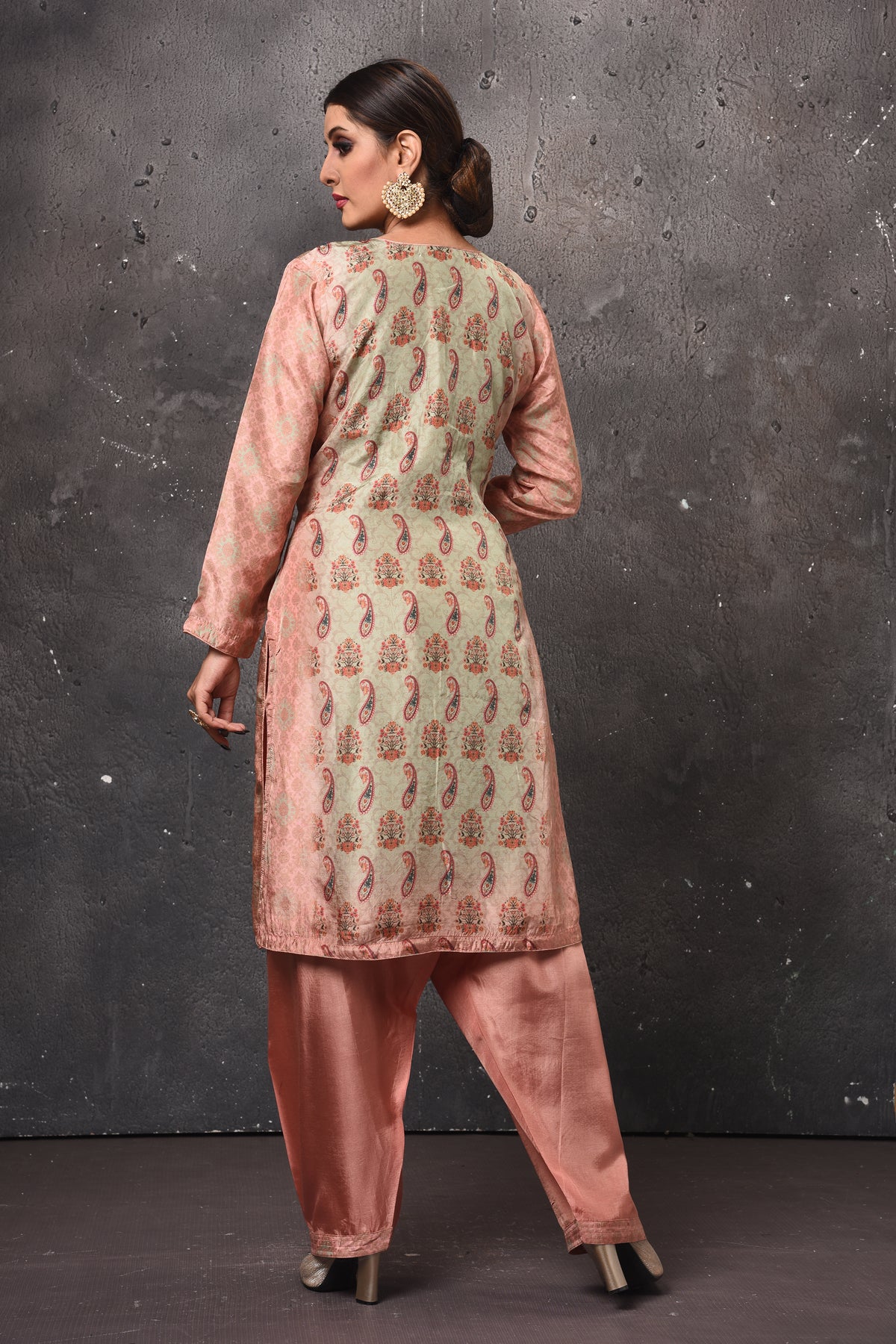 Shop stunning pista green and peach embroidered salwar suit online in USA with dupatta. Get set for weddings and festive occasions in exclusive designer Anarkali suits, wedding gown, salwar suits, gharara suits, Indowestern dresses from Pure Elegance Indian fashion store in USA.