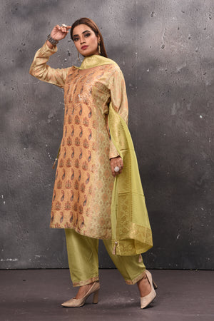 Shop beautiful peach and pista green embroidered salwar suit online in USA with dupatta. Get set for weddings and festive occasions in exclusive designer Anarkali suits, wedding gown, salwar suits, gharara suits, Indowestern dresses from Pure Elegance Indian fashion store in USA.-side