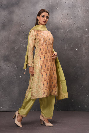 Shop beautiful peach and pista green embroidered salwar suit online in USA with dupatta. Get set for weddings and festive occasions in exclusive designer Anarkali suits, wedding gown, salwar suits, gharara suits, Indowestern dresses from Pure Elegance Indian fashion store in USA.-right