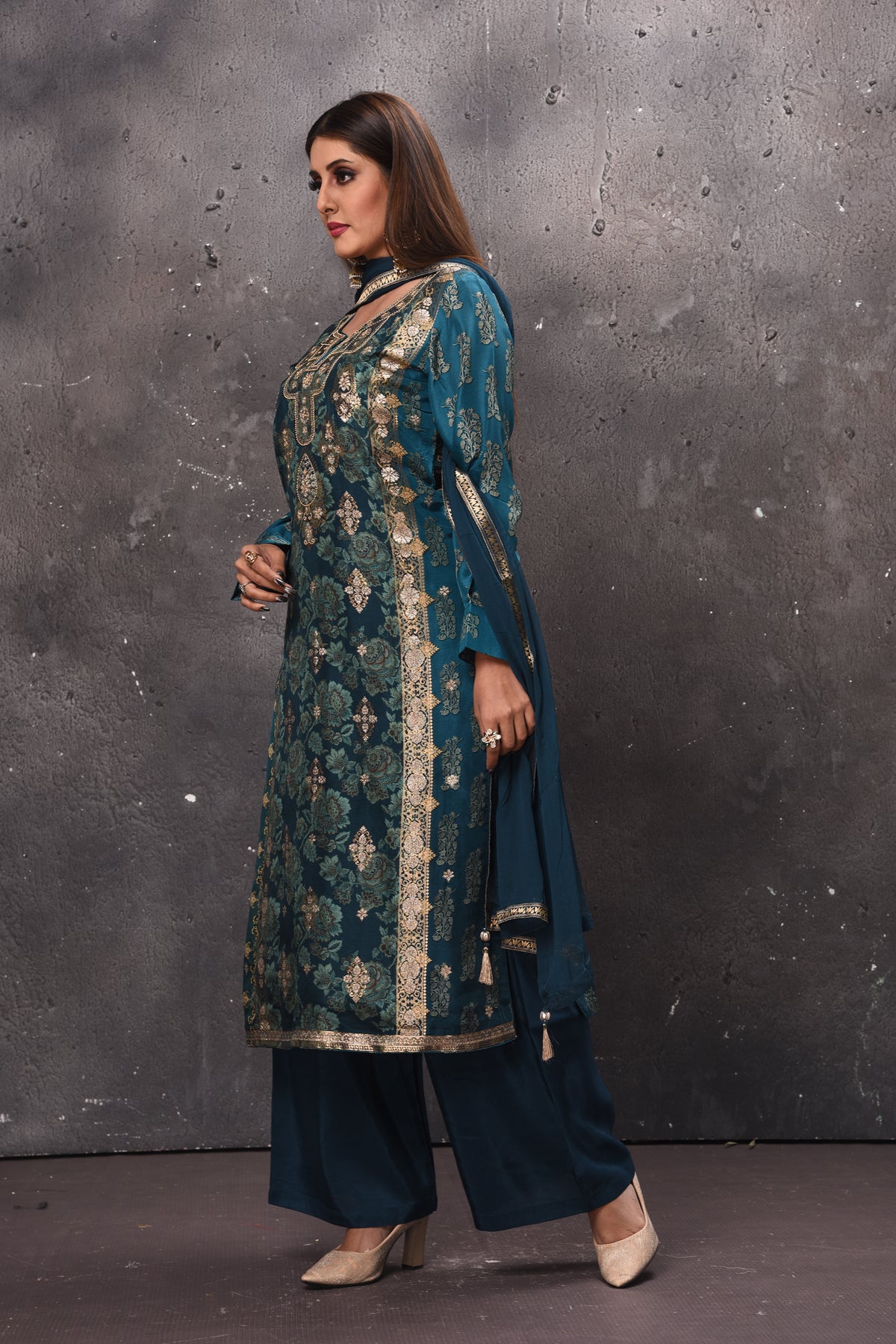 Shop beautiful teal green embroidered designer palazzo suit online in USA with dupatta. Get set for weddings and festive occasions in exclusive designer Anarkali suits, wedding gown, salwar suits, gharara suits, Indowestern dresses from Pure Elegance Indian fashion store in USA.-left