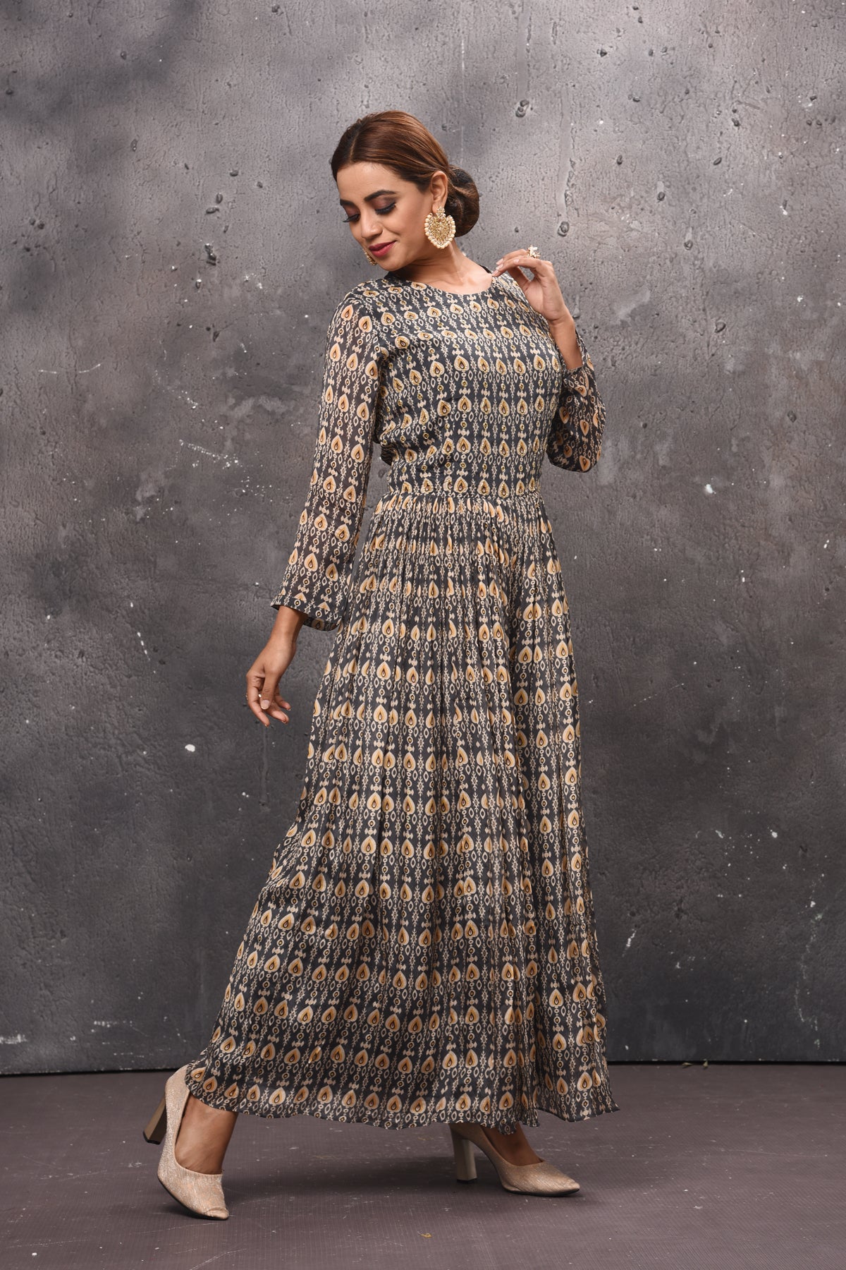 Shop beautiful dark grey printed jumpsuit online in USA with sheer back. Get set for weddings and festive occasions in exclusive designer Anarkali suits, wedding gown, salwar suits, gharara suits, Indowestern dresses from Pure Elegance Indian fashion store in USA-side