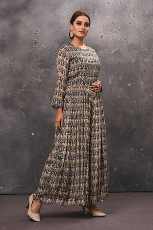 Shop beautiful dark grey printed jumpsuit online in USA with sheer back. Get set for weddings and festive occasions in exclusive designer Anarkali suits, wedding gown, salwar suits, gharara suits, Indowestern dresses from Pure Elegance Indian fashion store in USA-right
