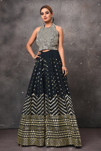 Buy black embellished palazzo online in USA with halter neck top. Get set for weddings and festive occasions in exclusive designer Anarkali suits, wedding gown, salwar suits, gharara suits, Indowestern dresses from Pure Elegance Indian fashion store in USA-full view