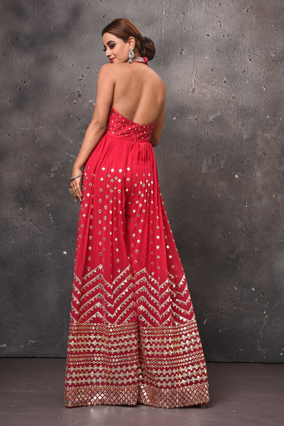 Shop beautiful pink embellished palazzo online in USA with halter neck top. Get set for weddings and festive occasions in exclusive designer Anarkali suits, wedding gown, salwar suits, gharara suits, Indowestern dresses from Pure Elegance Indian fashion store in USA.-back