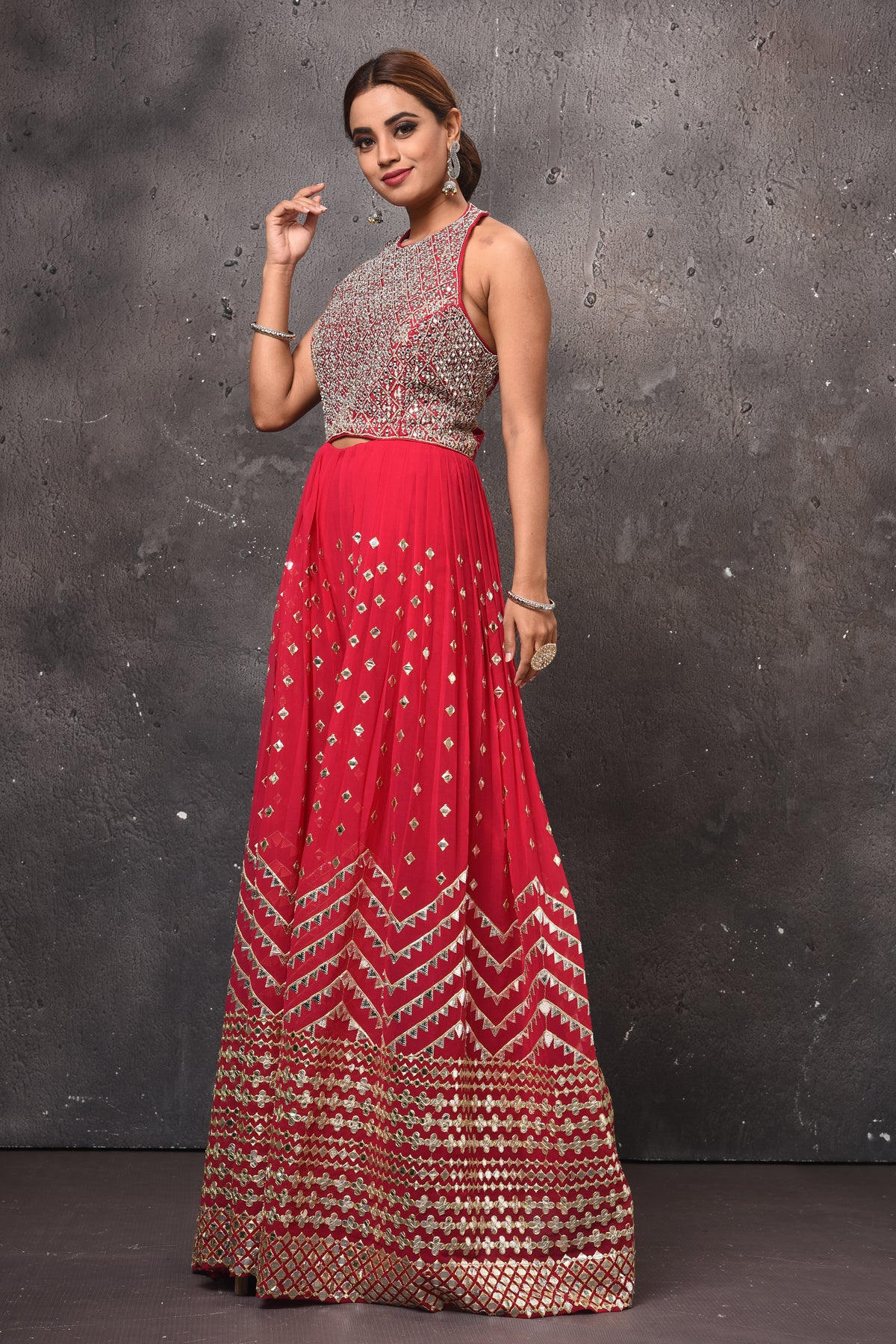 Shop beautiful pink embellished palazzo online in USA with halter neck top. Get set for weddings and festive occasions in exclusive designer Anarkali suits, wedding gown, salwar suits, gharara suits, Indowestern dresses from Pure Elegance Indian fashion store in USA-side