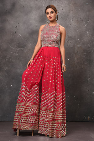 Shop beautiful pink embellished palazzo online in USA with halter neck top. Get set for weddings and festive occasions in exclusive designer Anarkali suits, wedding gown, salwar suits, gharara suits, Indowestern dresses from Pure Elegance Indian fashion store in USA-front