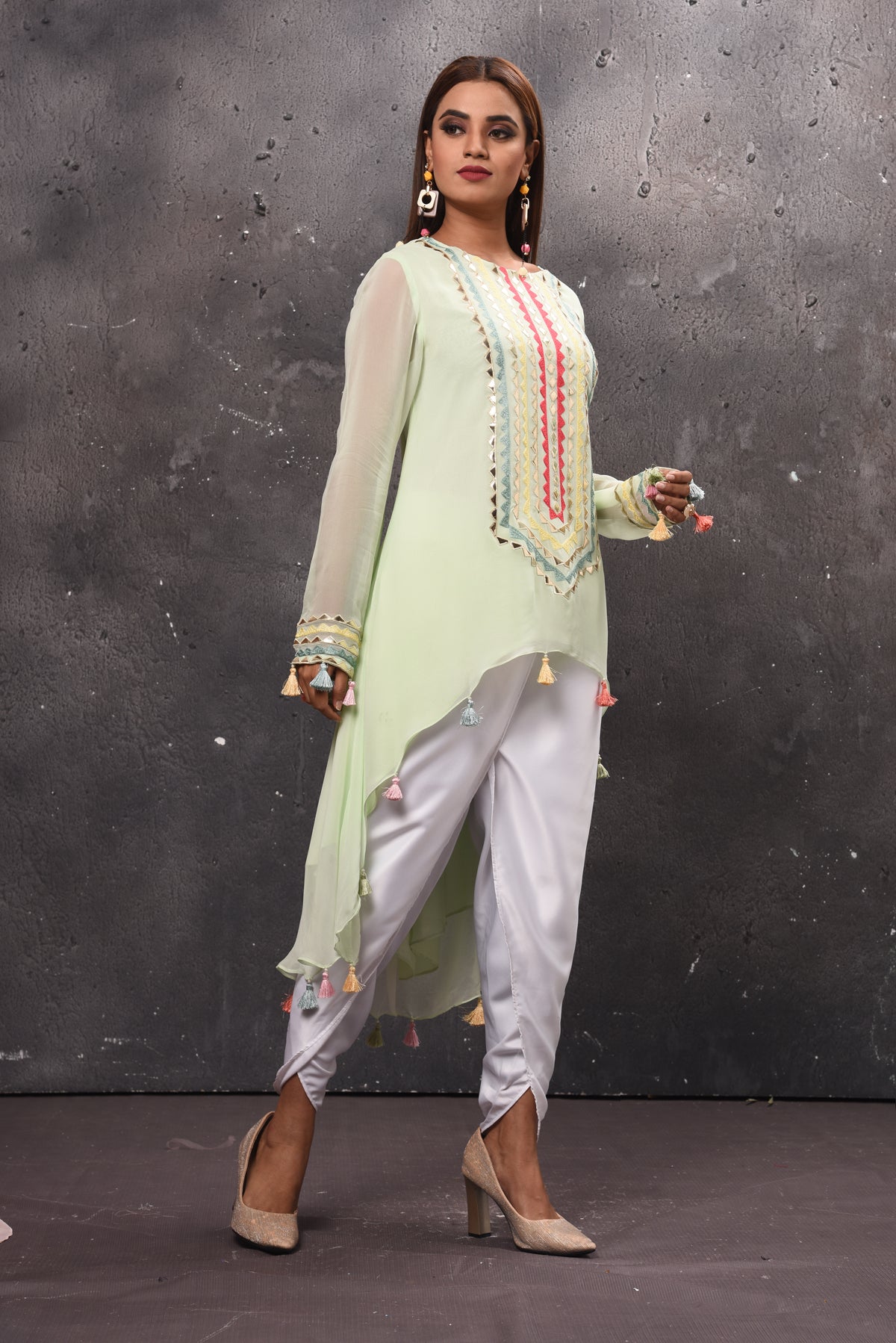 Shop stunning mint green embroidered salwar suit online in USA. Get set for weddings and festive occasions in exclusive designer Anarkali suits, wedding gown, salwar suits, gharara suits, Indowestern dresses from Pure Elegance Indian fashion store in USA.-side