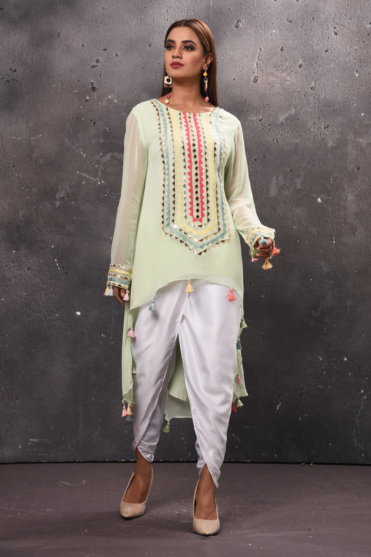 Shop stunning mint green embroidered salwar suit online in USA. Get set for weddings and festive occasions in exclusive designer Anarkali suits, wedding gown, salwar suits, gharara suits, Indowestern dresses from Pure Elegance Indian fashion store in USA-front