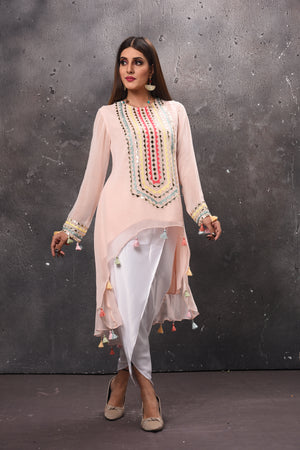 Shop beautiful cream and white embroidered salwar suit online in USA. Get set for weddings and festive occasions in exclusive designer Anarkali suits, wedding gown, salwar suits, gharara suits, Indowestern dresses from Pure Elegance Indian fashion store in USA.-side