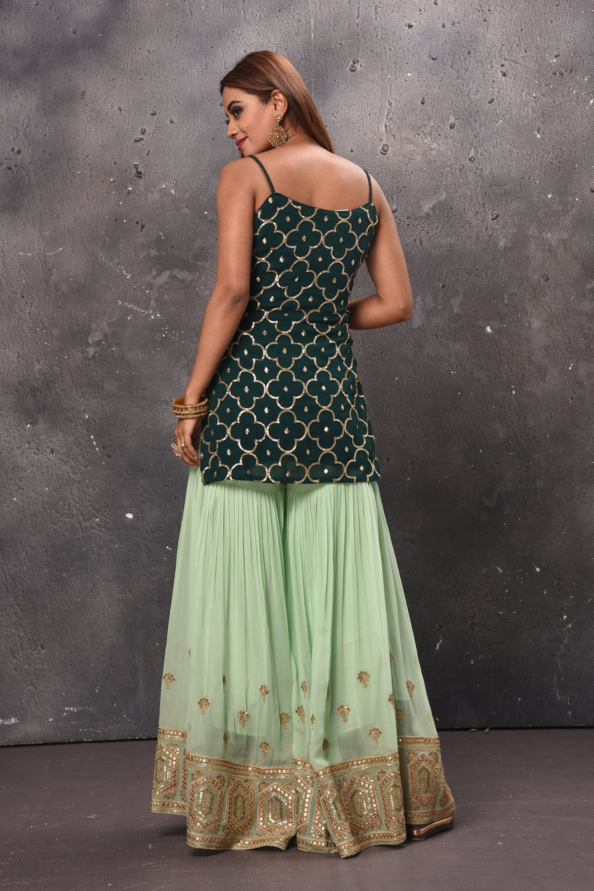 Buy beautiful mint green and dark green embroidered sharara suit online in USA. Get set for weddings and festive occasions in exclusive designer Anarkali suits, wedding gown, salwar suits, gharara suits, Indowestern dresses from Pure Elegance Indian fashion store in USA.-back