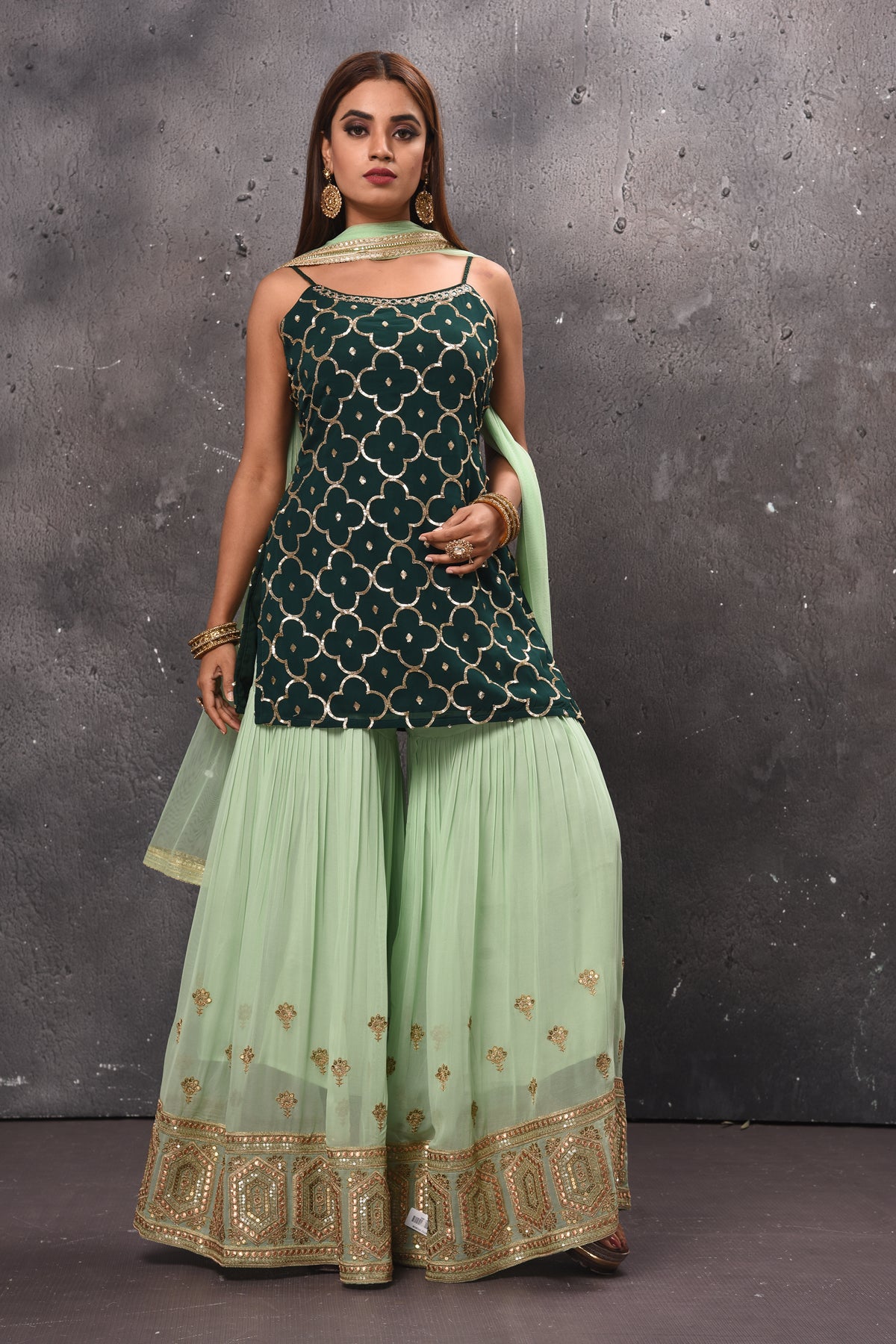 Buy beautiful mint green and dark green embroidered sharara suit online in USA. Get set for weddings and festive occasions in exclusive designer Anarkali suits, wedding gown, salwar suits, gharara suits, Indowestern dresses from Pure Elegance Indian fashion store in USA.-full view