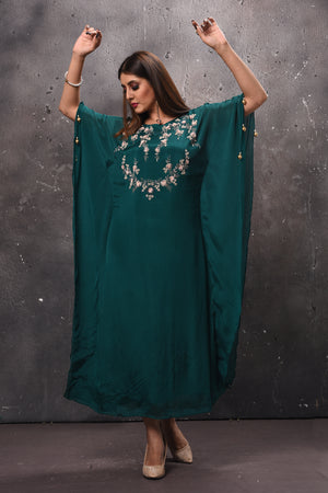 Buy stunning dark green embroidered kaftaan dress online in USA. Get set for weddings and festive occasions in exclusive designer Anarkali suits, wedding gown, salwar suits, gharara suits, Indowestern dresses from Pure Elegance Indian fashion store in USA.-front