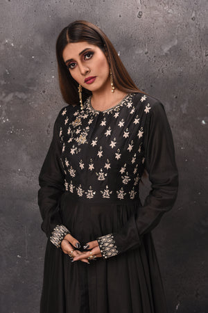 Buy stunning black embroidered front slit Anarkali suit online in USA. Get set for weddings and festive occasions in exclusive designer Anarkali suits, wedding gown, salwar suits, gharara suits, Indowestern dresses from Pure Elegance Indian fashion store in USA.-closeup