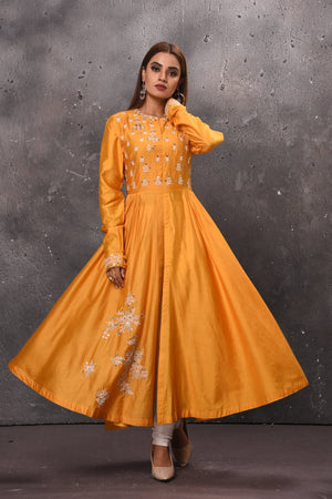 Shop stunning yellow embroidered front slit Anarkali suit online in USA. Get set for weddings and festive occasions in exclusive designer Anarkali suits, wedding gown, salwar suits, gharara suits, Indowestern dresses from Pure Elegance Indian fashion store in USA.-flare
