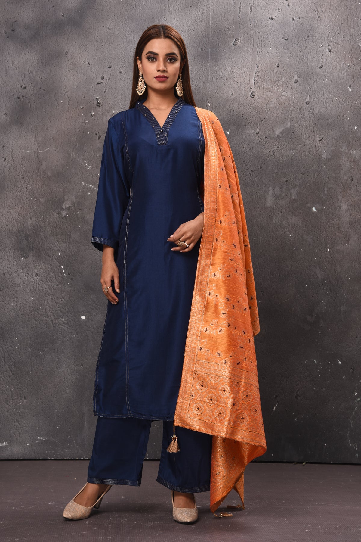 Shop beautiful solid navy blue palazzo suit online in USA with peach dupatta. Get set for weddings and festive occasions in exclusive designer Anarkali suits, wedding gown, salwar suits, gharara suits, Indowestern dresses from Pure Elegance Indian fashion store in USA.-full view
