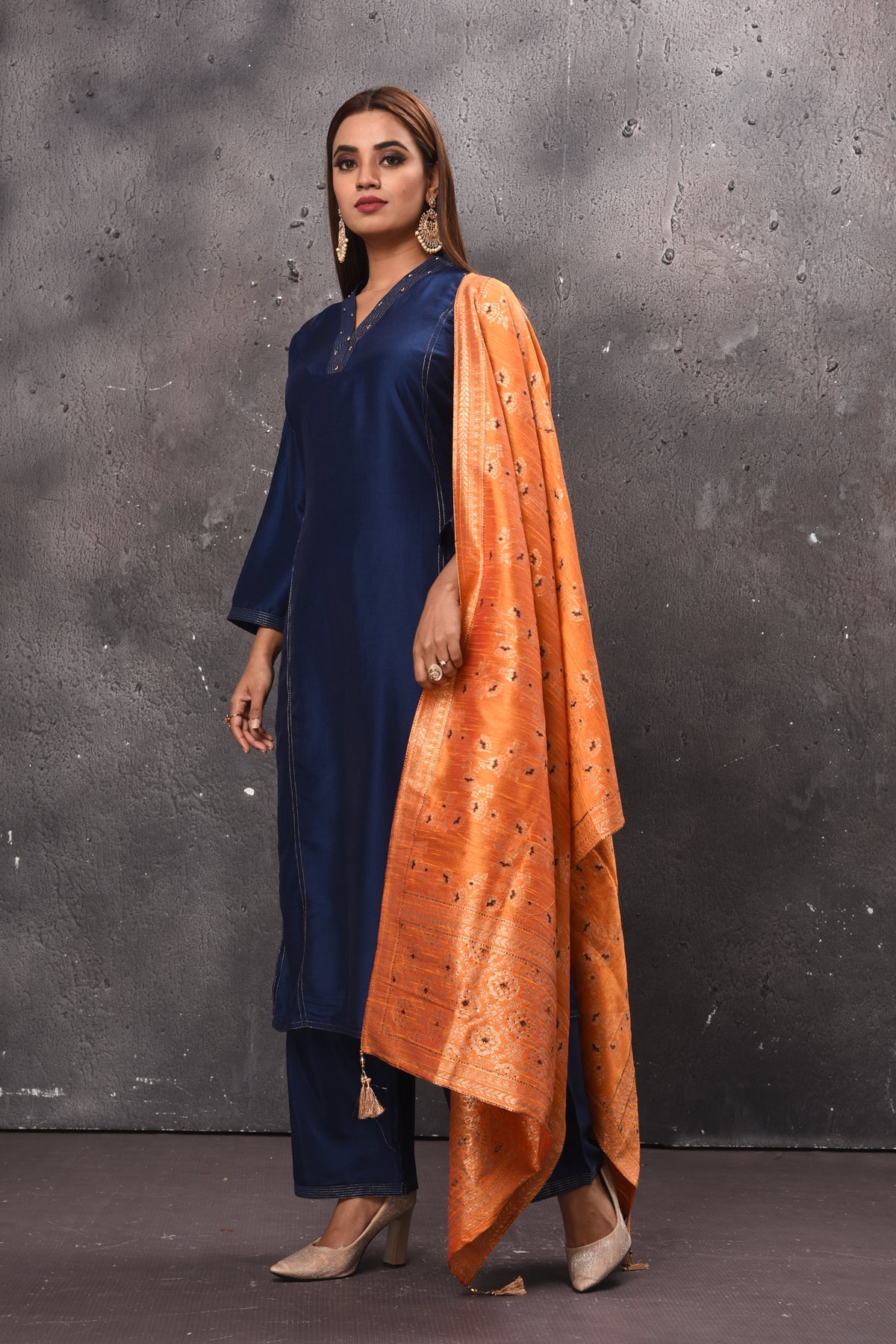 Shop beautiful solid navy blue palazzo suit online in USA with peach dupatta. Get set for weddings and festive occasions in exclusive designer Anarkali suits, wedding gown, salwar suits, gharara suits, Indowestern dresses from Pure Elegance Indian fashion store in USA.-side