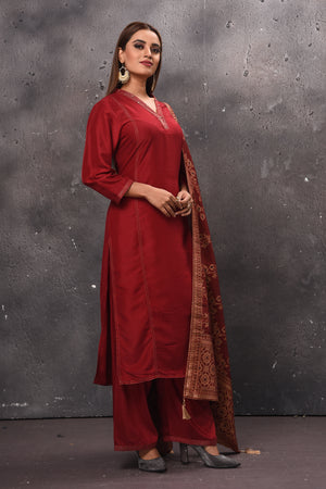 Shop solid maroon palazzo suit online in USA with Banarasi dupatta. Get set for weddings and festive occasions in exclusive designer Anarkali suits, wedding gown, salwar suits, gharara suits, Indowestern dresses from Pure Elegance Indian fashion store in USA.-right