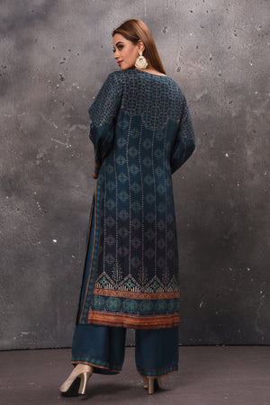 Shop teal green printed palazzo suit online in USA with dupatta. Get set for weddings and festive occasions in exclusive designer Anarkali suits, wedding gown, salwar suits, gharara suits, Indowestern dresses from Pure Elegance Indian fashion store in USA.-back