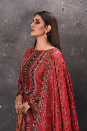 Shop stunning red printed palazzo suit online in USA with dupatta. Get set for weddings and festive occasions in exclusive designer Anarkali suits, wedding gown, salwar suits, gharara suits, Indowestern dresses from Pure Elegance Indian fashion store in USA.-closeup