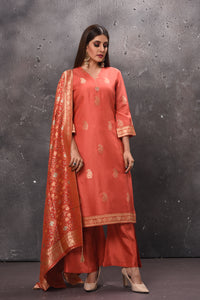 Buy elegant orange designer palazzo suit online in USA with dupatta. Get set for weddings and festive occasions in exclusive designer Anarkali suits, wedding gown, salwar suits, gharara suits, Indowestern dresses from Pure Elegance Indian fashion store in USA.-full view