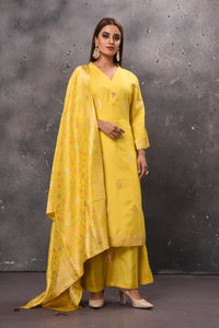 Shop stunning yellow designer palazzo suit online in USA with dupatta. Get set for weddings and festive occasions in exclusive designer Anarkali suits, wedding gown, salwar suits, gharara suits, Indowestern dresses from Pure Elegance Indian fashion store in USA.-full view