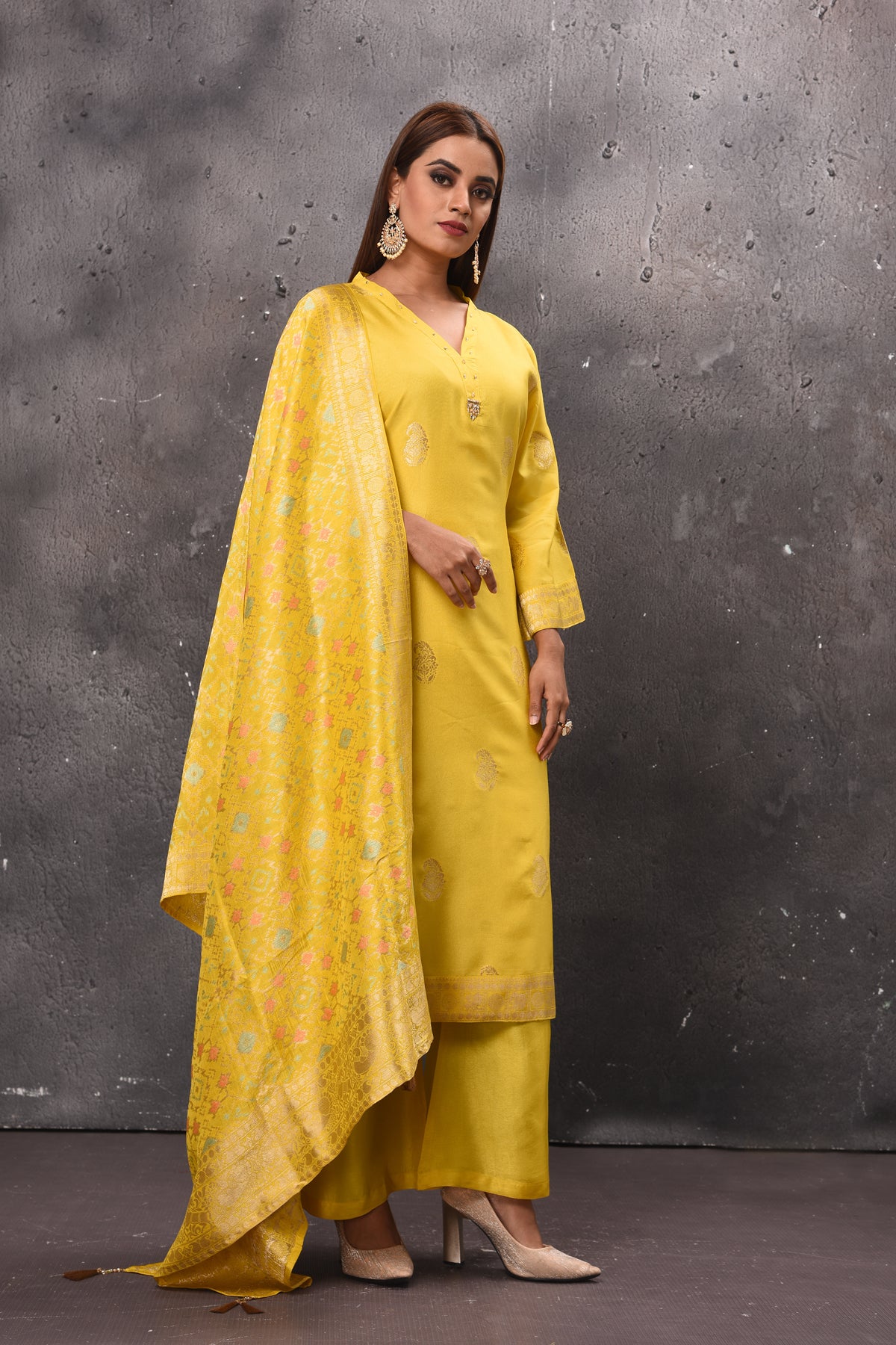 Shop stunning yellow designer palazzo suit online in USA with dupatta. Get set for weddings and festive occasions in exclusive designer Anarkali suits, wedding gown, salwar suits, gharara suits, Indowestern dresses from Pure Elegance Indian fashion store in USA.-side