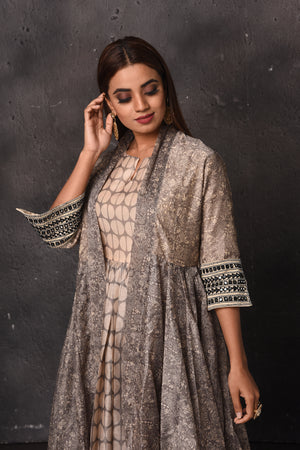 Shop stunning grey printed dress online in USA with jacket. Get set for weddings and festive occasions in exclusive designer Anarkali suits, wedding gown, salwar suits, gharara suits, Indowestern dresses from Pure Elegance Indian fashion store in USA.-closeup