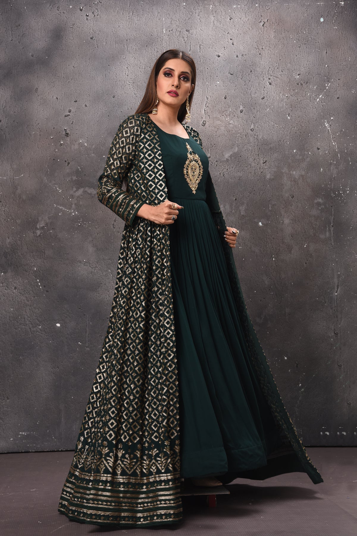 Buy stunning dark green maxi dress online in USA with jacket. Get set for weddings and festive occasions in exclusive designer Anarkali suits, wedding gown, salwar suits, gharara suits, Indowestern dresses from Pure Elegance Indian fashion store in USA.-full view