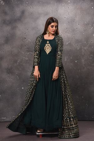 Buy stunning dark green maxi dress online in USA with jacket. Get set for weddings and festive occasions in exclusive designer Anarkali suits, wedding gown, salwar suits, gharara suits, Indowestern dresses from Pure Elegance Indian fashion store in USA.-front