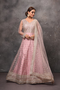 Shop beautiful light pink embroidered Anarkali suit online in USA with dupatta. Get set for weddings and festive occasions in exclusive designer Anarkali suits, wedding gown, salwar suits, gharara suits, Indowestern dresses from Pure Elegance Indian fashion store in USA.-full view