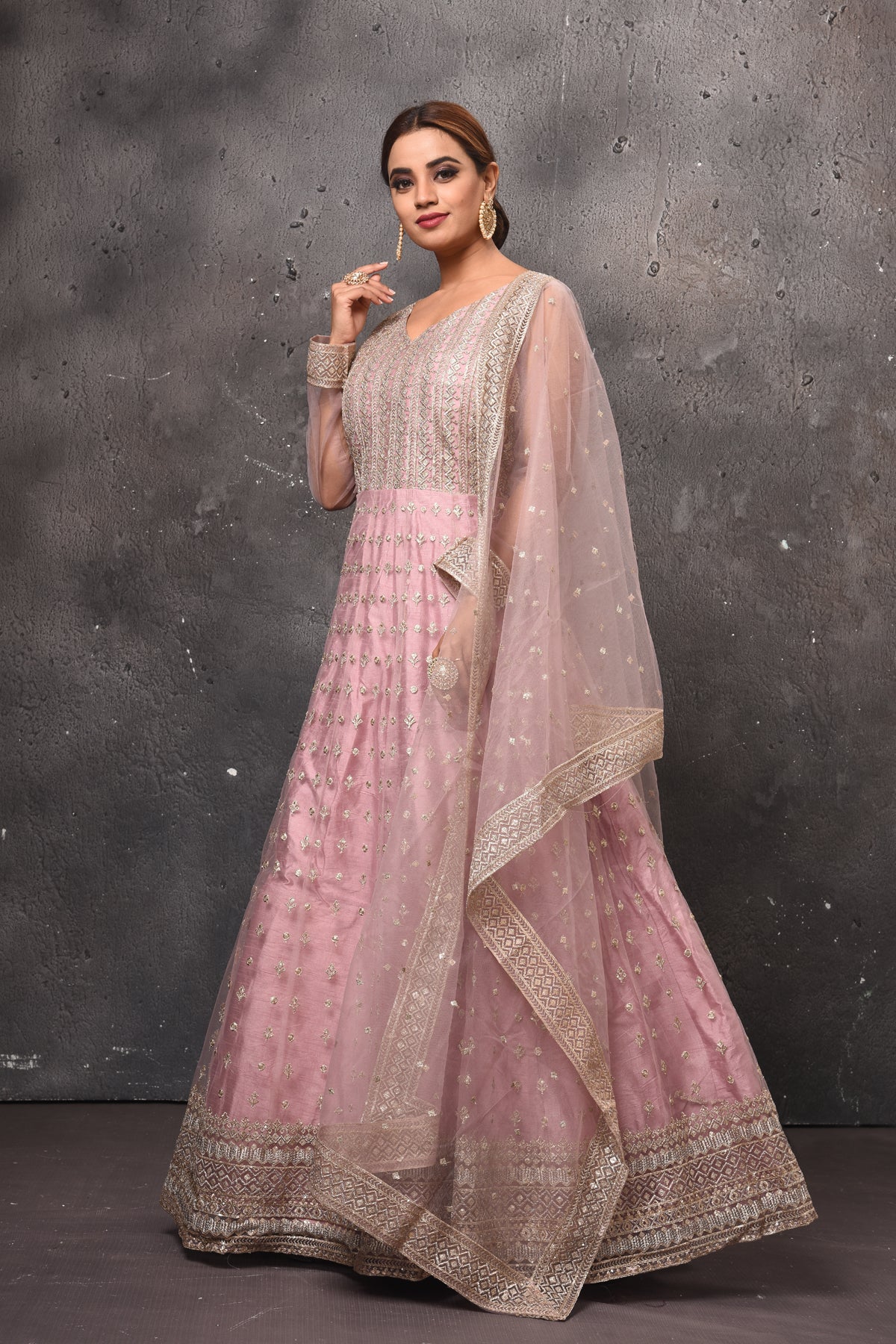 Shop beautiful light pink embroidered Anarkali suit online in USA with dupatta. Get set for weddings and festive occasions in exclusive designer Anarkali suits, wedding gown, salwar suits, gharara suits, Indowestern dresses from Pure Elegance Indian fashion store in USA.-side