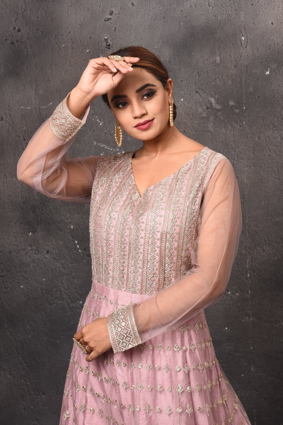 Shop beautiful light pink embroidered Anarkali suit online in USA with dupatta. Get set for weddings and festive occasions in exclusive designer Anarkali suits, wedding gown, salwar suits, gharara suits, Indowestern dresses from Pure Elegance Indian fashion store in USA.-closeup