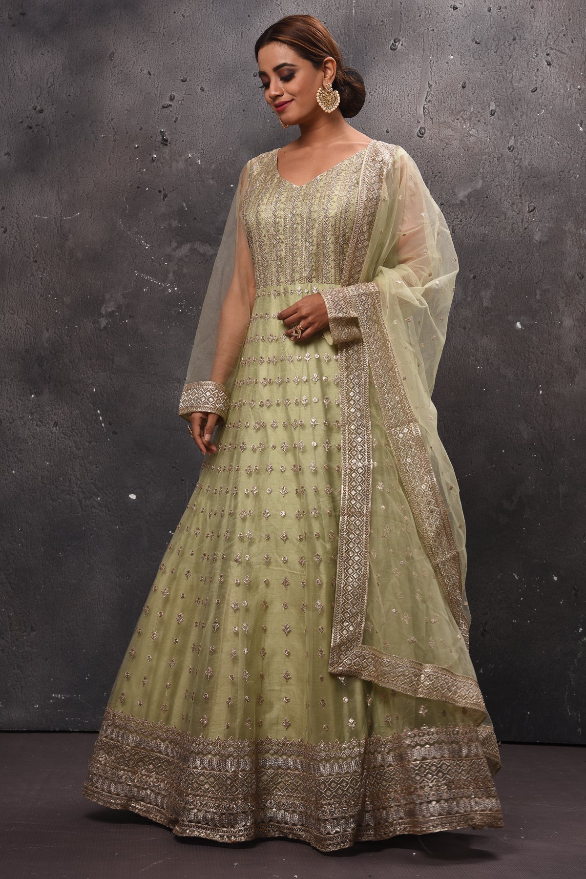 Buy beautiful pista green embroidered Anarkali suit online in USA with dupatta. Get set for weddings and festive occasions in exclusive designer Anarkali suits, wedding gown, salwar suits, gharara suits, Indowestern dresses from Pure Elegance Indian fashion store in USA.-side