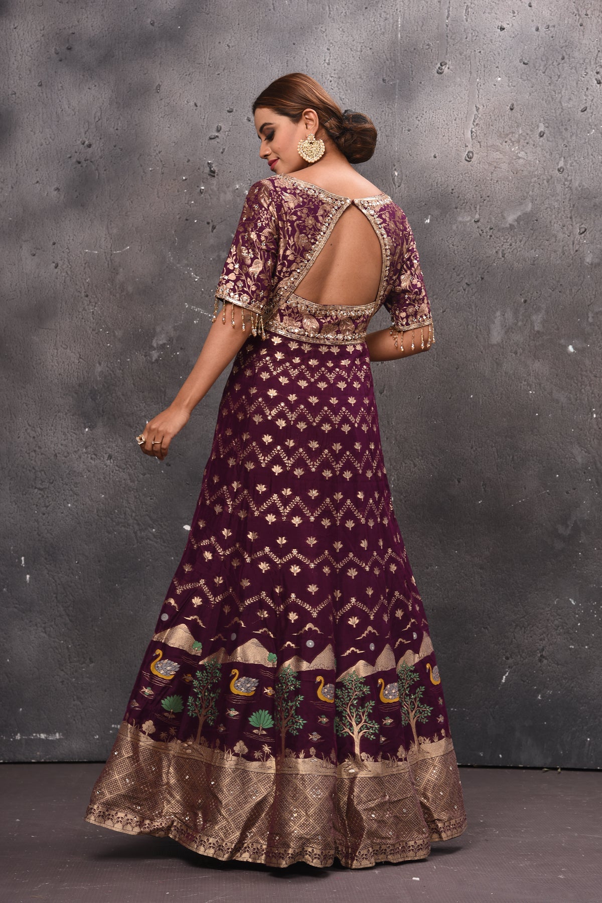 Buy beautiful wine color embroidered Anarkali suit online in USA with dupatta. Get set for weddings and festive occasions in exclusive designer Anarkali suits, wedding gown, salwar suits, gharara suits, Indowestern dresses from Pure Elegance Indian fashion store in USA.-back