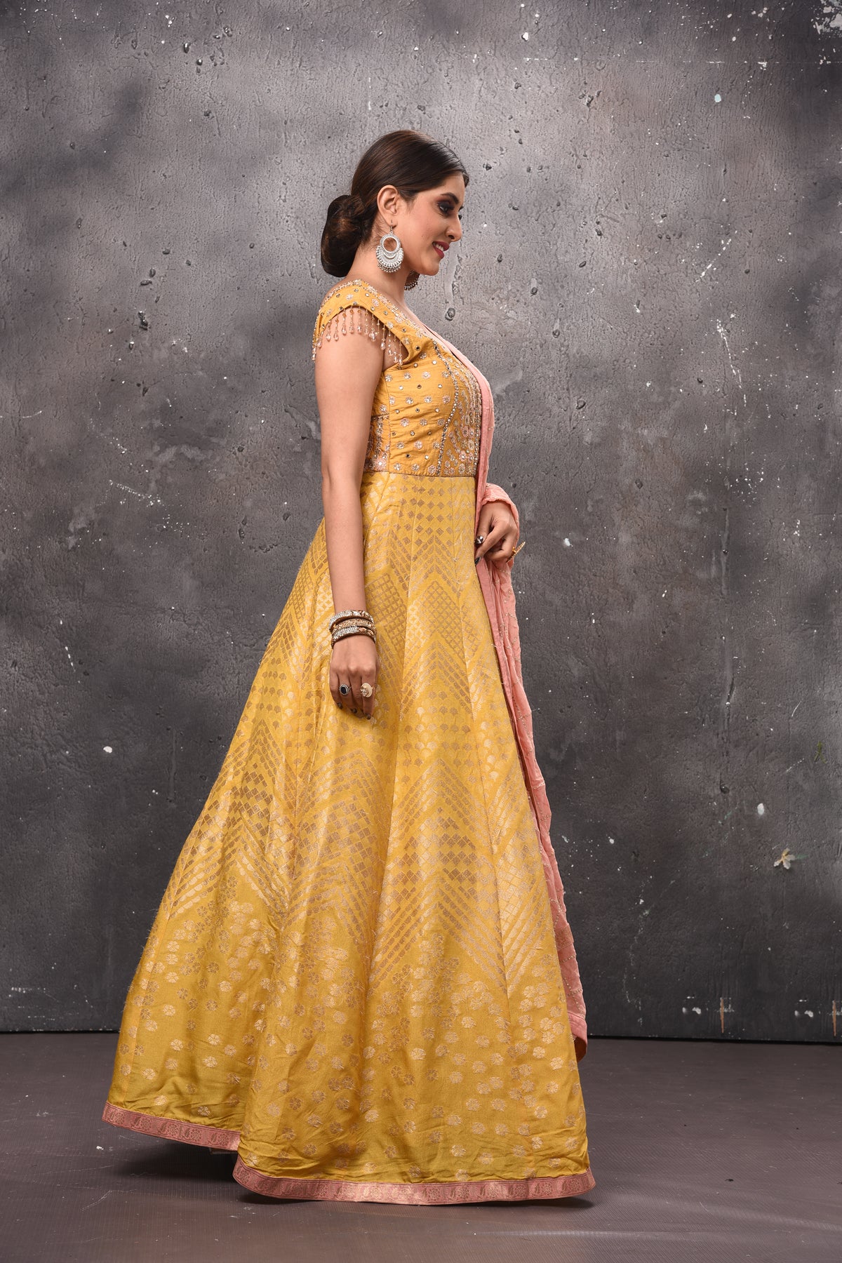 Buy stunning yellow embroidered Anarkali suit online in USA with pink dupatta. Get set for weddings and festive occasions in exclusive designer Anarkali suits, wedding gown, salwar suits, gharara suits, Indowestern dresses from Pure Elegance Indian fashion store in USA.-right