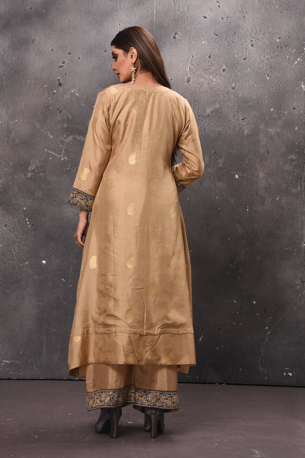 Shop stunning beige designer palazzo suit online in USA with blue Banarasi dupatta. Get set for weddings and festive occasions in exclusive designer Anarkali suits, wedding gown, salwar suits, gharara suits, Indowestern dresses from Pure Elegance Indian fashion store in USA.-back