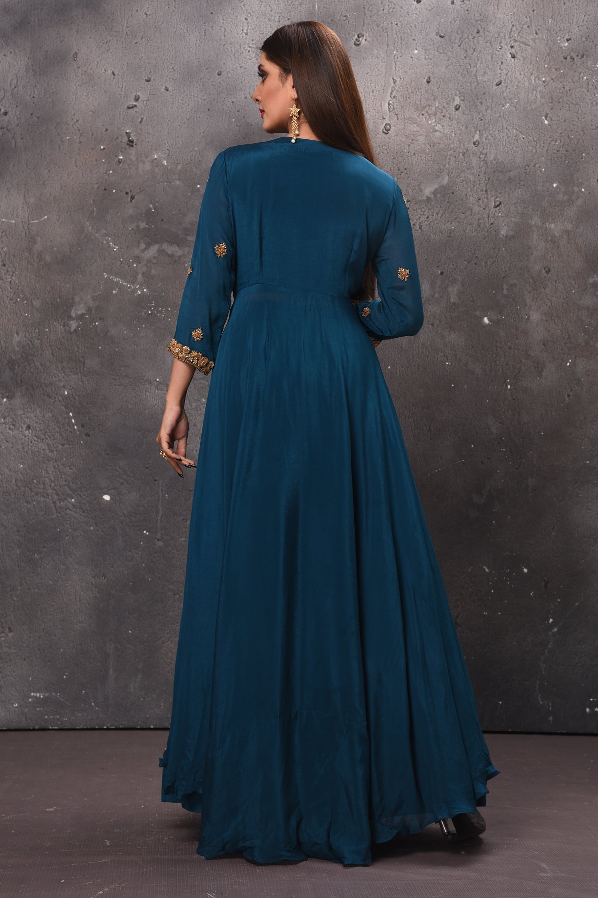 Buy stunning blue embroidered layered Anarkali suit online in USA. Get set for weddings and festive occasions in exclusive designer Anarkali suits, wedding gown, salwar suits, gharara suits, Indowestern dresses from Pure Elegance Indian fashion store in USA.-back