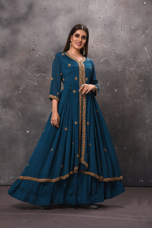 Buy stunning blue embroidered layered Anarkali suit online in USA. Get set for weddings and festive occasions in exclusive designer Anarkali suits, wedding gown, salwar suits, gharara suits, Indowestern dresses from Pure Elegance Indian fashion store in USA.-front