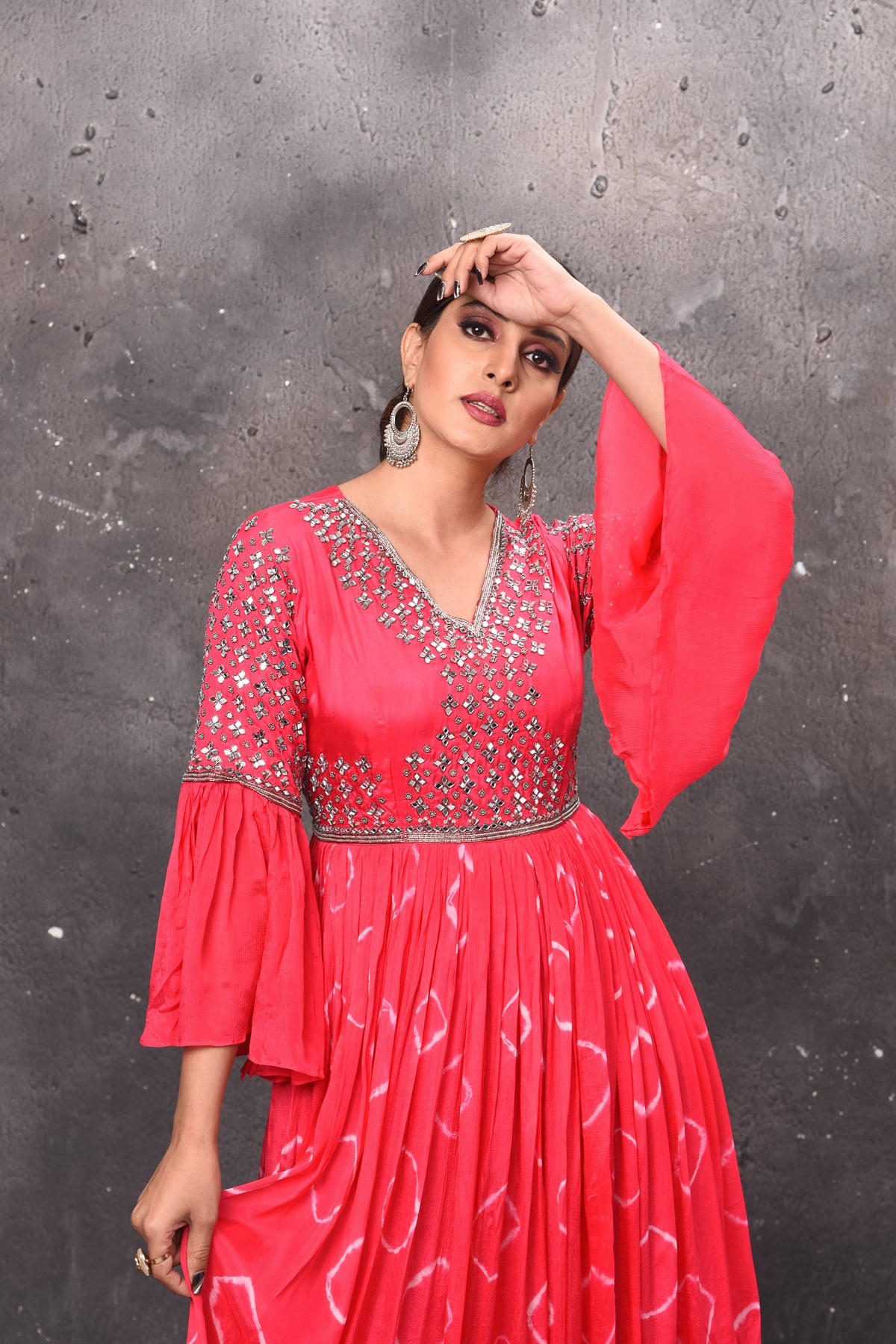 Shop beautiful pink mirror work and tie and dye gown online in USA with bell sleeves. Get set for weddings and festive occasions in exclusive designer Anarkali suits, wedding gown, salwar suits, gharara suits, Indowestern dresses from Pure Elegance Indian fashion store in USA.-closeup