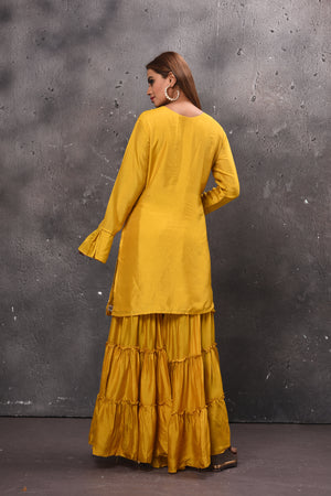 Shop beautiful yellow tiered sharara suit online in USA with dupatta. Get set for weddings and festive occasions in exclusive designer Anarkali suits, wedding gown, salwar suits, gharara suits, Indowestern dresses from Pure Elegance Indian fashion store in USA.-back