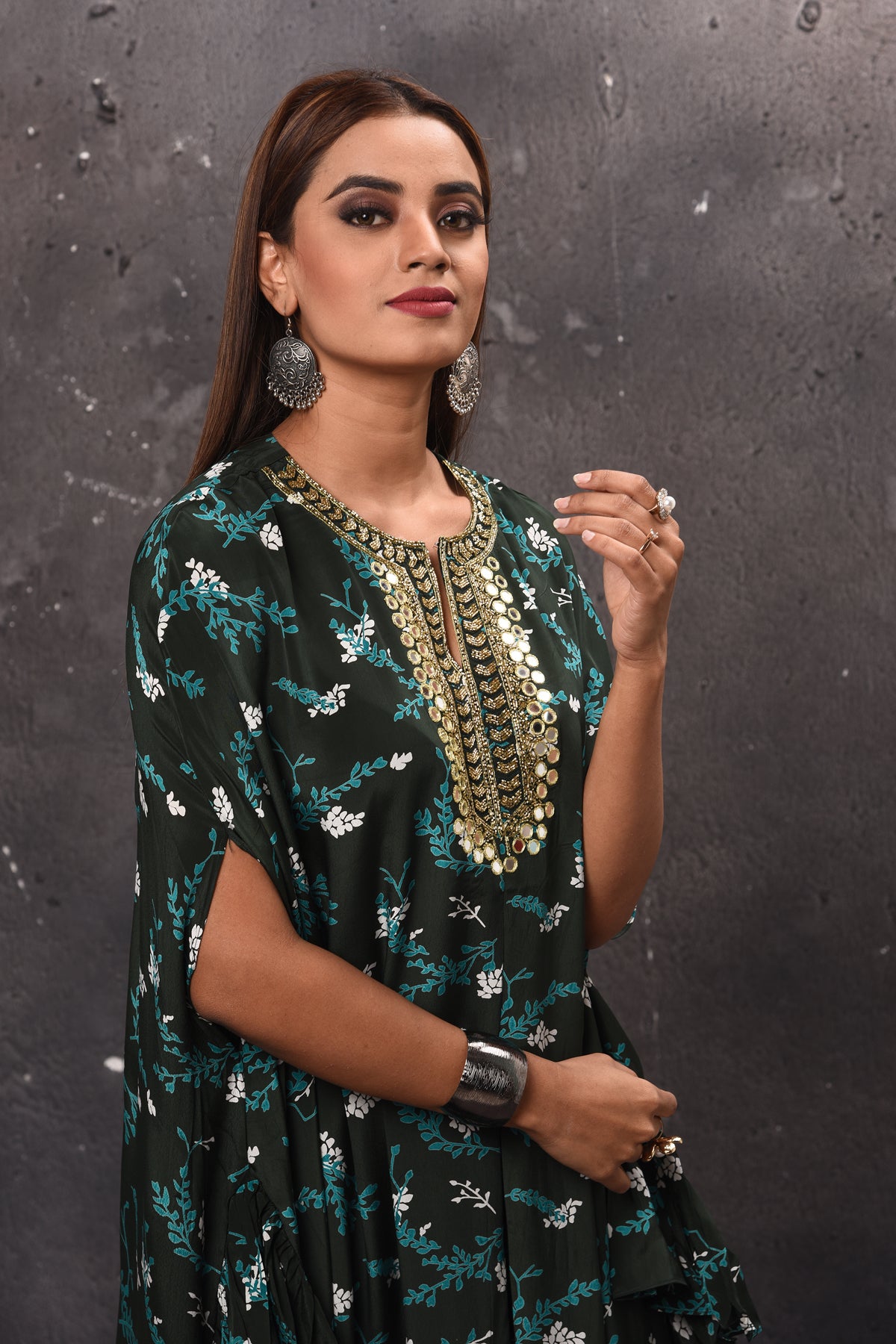 Shop stunning black and green printed kaftan suit online in USA with palazzo. Get set for weddings and festive occasions in exclusive designer Anarkali suits, wedding gown, salwar suits, gharara suits, Indowestern dresses from Pure Elegance Indian fashion store in USA.-closeup