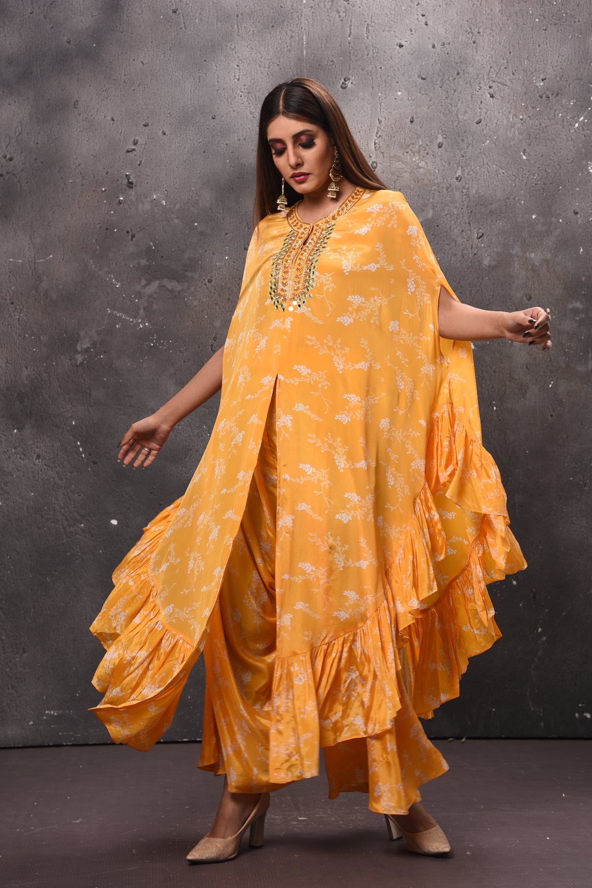 Shop beautiful yellow printed kaftan suit online in USA with palazzo. Get set for weddings and festive occasions in exclusive designer Anarkali suits, wedding gown, salwar suits, gharara suits, Indowestern dresses from Pure Elegance Indian fashion store in USA.-left