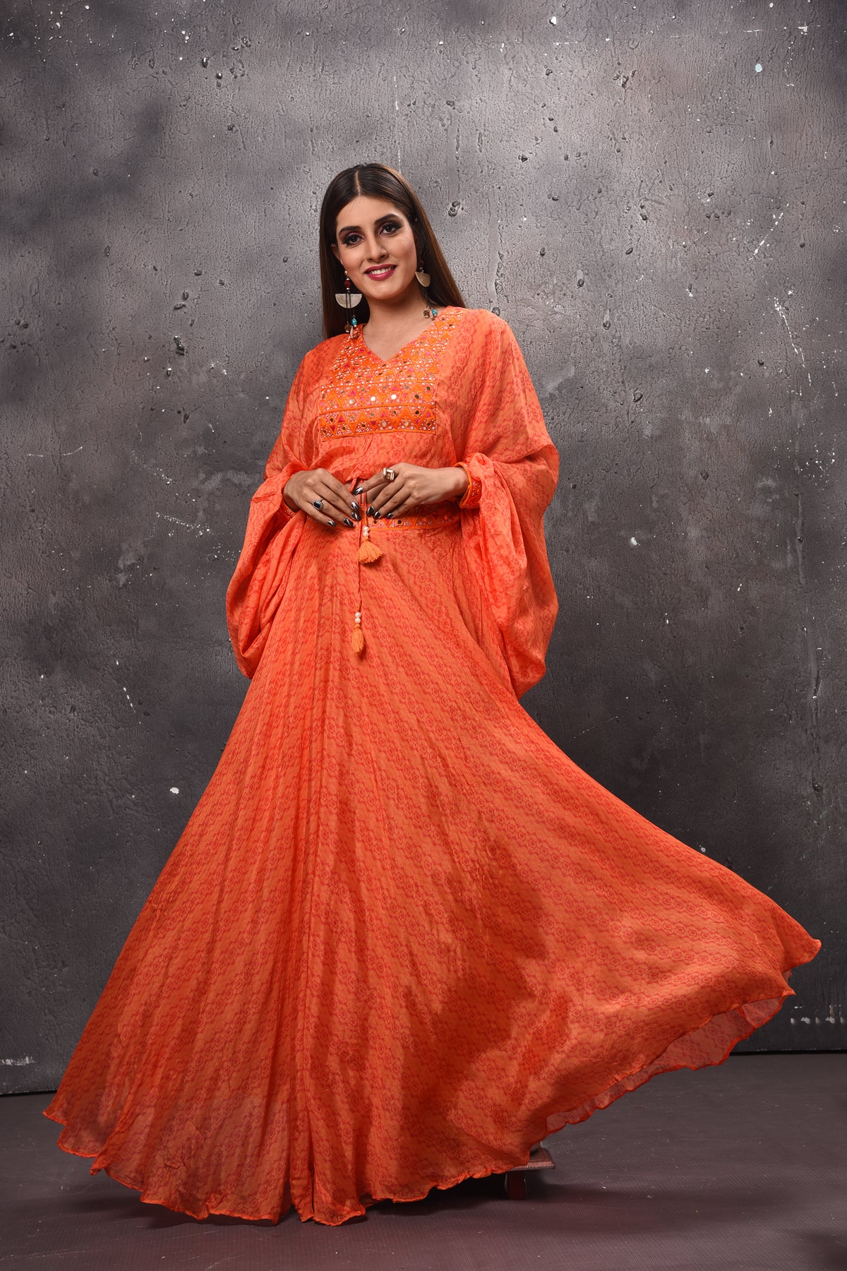 Shop beautiful orange mirror work skirt set online in USA. Get set for weddings and festive occasions in exclusive designer Anarkali suits, wedding gown, salwar suits, gharara suits, Indowestern dresses from Pure Elegance Indian fashion store in USA.-skirt