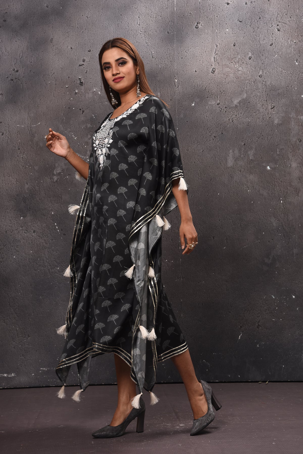 Shop stunning black printed embroidered kaftaan dress online in USA. Get set for weddings and festive occasions in exclusive designer Anarkali suits, wedding gown, salwar suits, gharara suits, Indowestern dresses from Pure Elegance Indian fashion store in USA.-left
