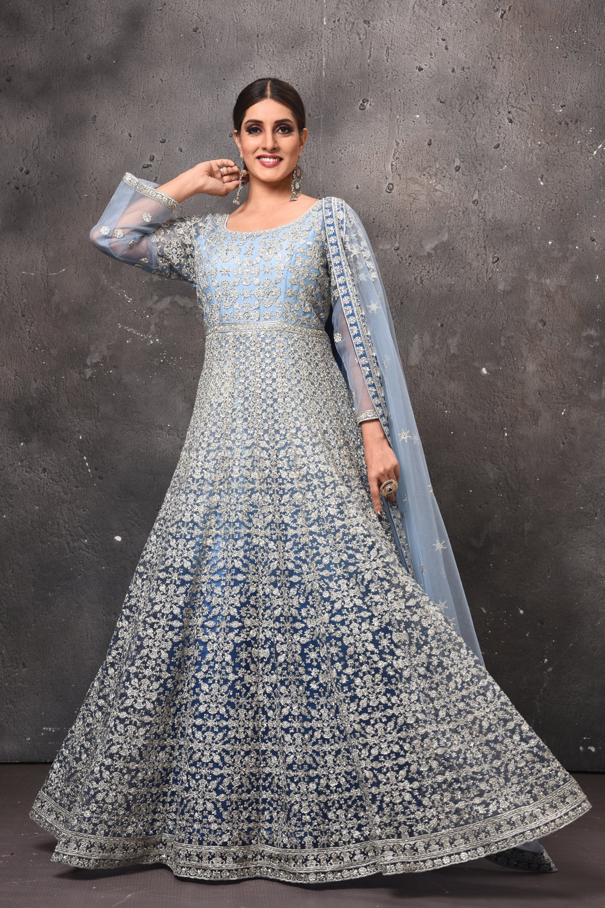 Buy beautiful light blue embroidered Anarkali suit online in USA with dupatta. Get set for weddings and festive occasions in exclusive designer Anarkali suits, wedding gown, salwar suits, gharara suits, Indowestern dresses from Pure Elegance Indian fashion store in USA.-front
