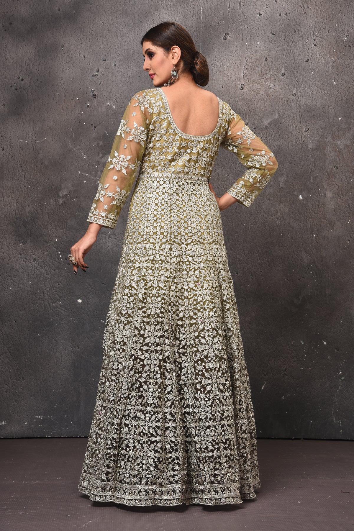 Shop beautiful olive green embroidered floorlength Anarkali suit online in USA with dupatta. Get set for weddings and festive occasions in exclusive designer Anarkali suits, wedding gown, salwar suits, gharara suits, Indowestern dresses from Pure Elegance Indian fashion store in USA.-back