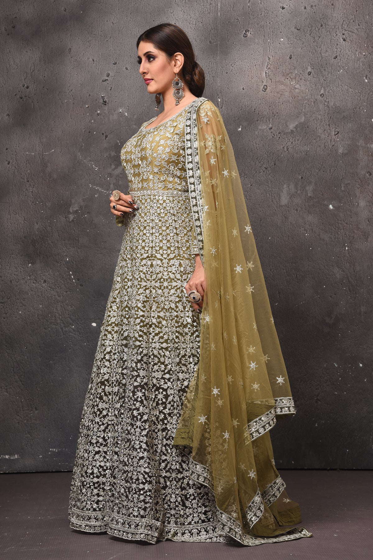Shop beautiful olive green embroidered floorlength Anarkali suit online in USA with dupatta. Get set for weddings and festive occasions in exclusive designer Anarkali suits, wedding gown, salwar suits, gharara suits, Indowestern dresses from Pure Elegance Indian fashion store in USA.-side
