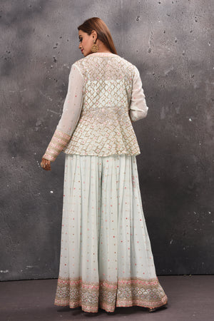 Shop beautiful white embroidered palazzo online in USA with crop top and jacket. Get set for weddings and festive occasions in exclusive designer Anarkali suits, wedding gown, salwar suits, gharara suits, Indowestern dresses from Pure Elegance Indian fashion store in USA.-back
