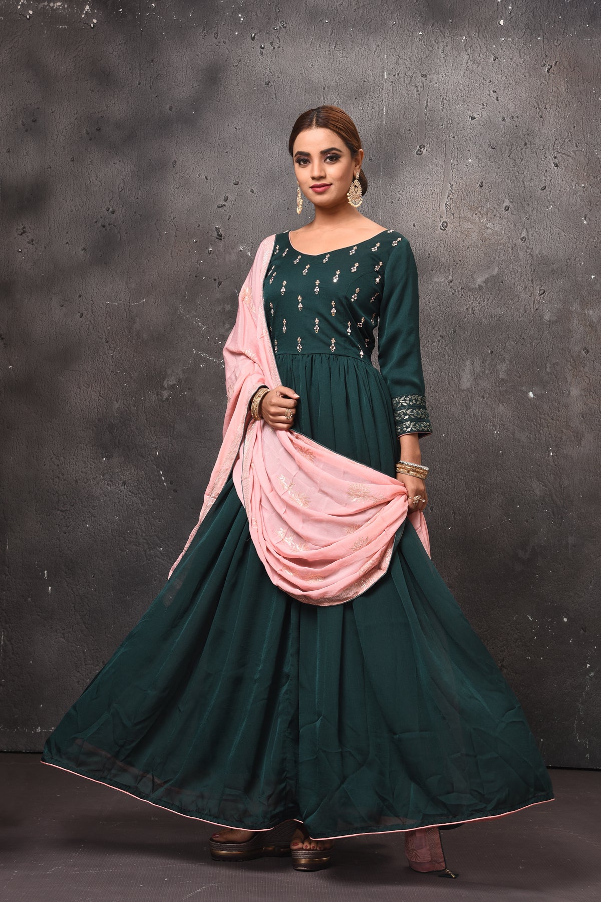 Buy beautiful dark green embroidered Anarkali suit online in USA with pink dupatta. Get set for weddings and festive occasions in exclusive designer Anarkali suits, wedding gown, salwar suits, gharara suits, Indowestern dresses from Pure Elegance Indian fashion store in USA.-full view